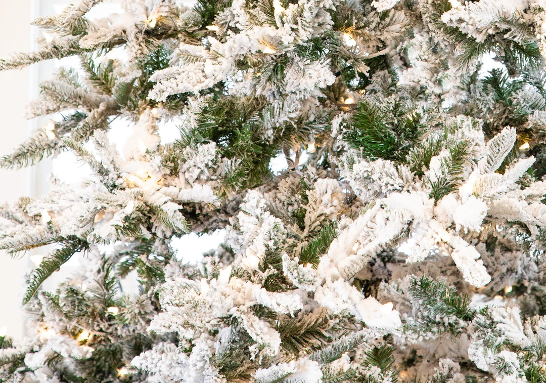 The Christmas Palace CHRISTMAS TREES 10 FT SNOW PINE SLIM PRE LIT CLEAR LIGHTS 2 The Christmas Palace CHRISTMAS TREES 10 FT SNOW PINE SLIM PRE LIT CLEAR LIGHTS