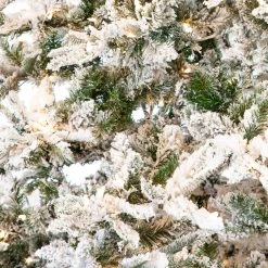 The Christmas Palace 9 FT SNOW PINE SLIM PRE LIT CLEAR LIGHTS CHRISTMAS TREES