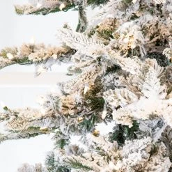 The Christmas Palace CHRISTMAS TREES 10 FT SNOW PINE SLIM PRE LIT CLEAR LIGHTS 5 The Christmas Palace CHRISTMAS TREES 10 FT SNOW PINE SLIM PRE LIT CLEAR LIGHTS