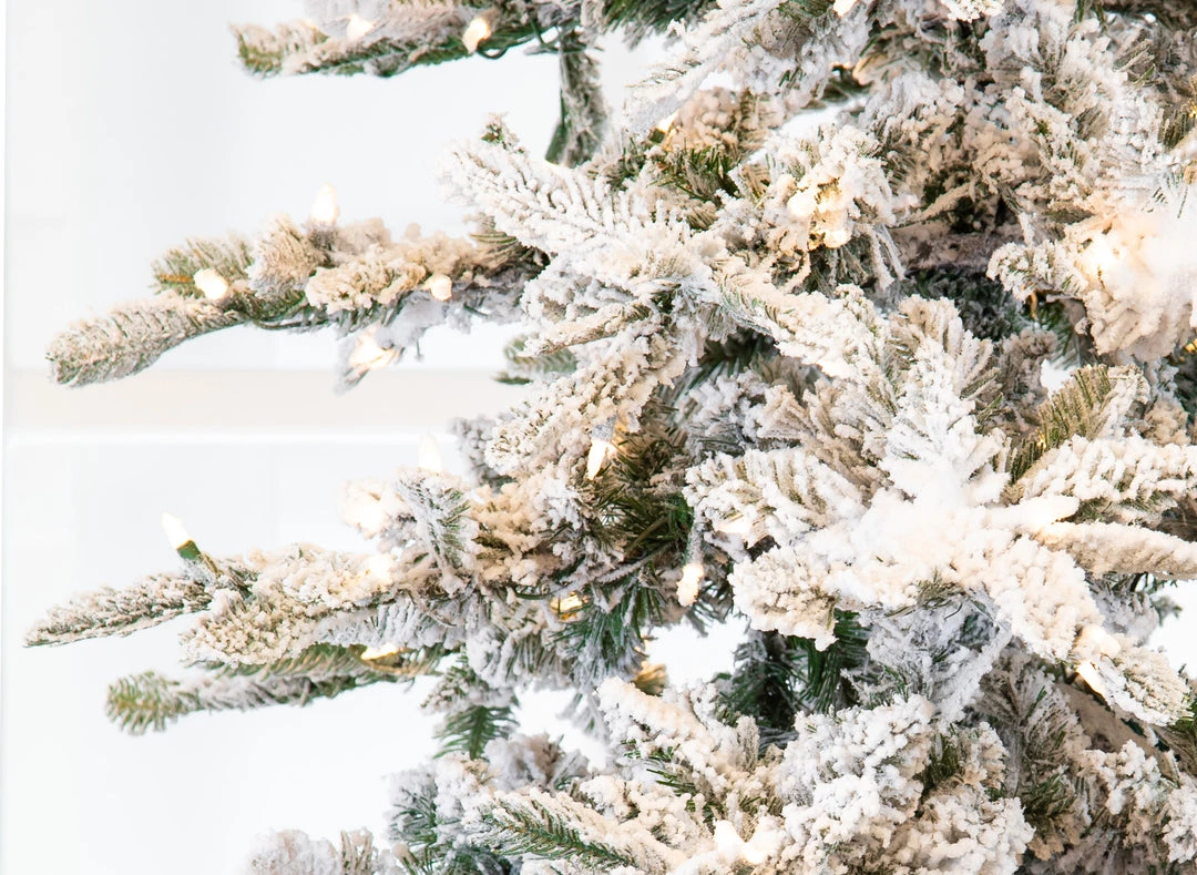 The Christmas Palace CHRISTMAS TREES 10 FT SNOW PINE SLIM PRE LIT CLEAR LIGHTS 3 The Christmas Palace CHRISTMAS TREES 10 FT SNOW PINE SLIM PRE LIT CLEAR LIGHTS