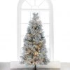 The Christmas Palace 7.5 FT CRYSTAL FLOCKED TREE PRE LIT WARM WHITE LED