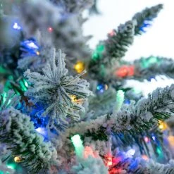 The Christmas Palace 9 FT WYOMING FLOCKED TREE PRE LIT COLOR CHANGING LED