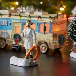 The Christmas Palace SNOW VILLAGE "NATIONAL LAMPOONS" COUSIN EDDIE IN THE MORNING Department 56